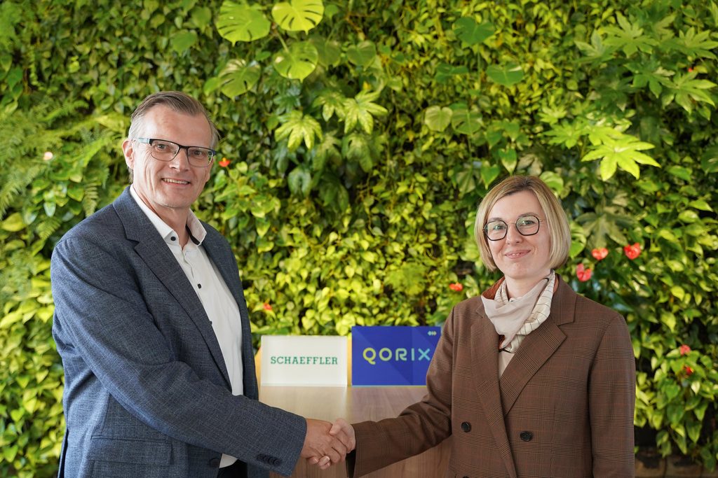 Gerd Winkler, Head of Strategy Software-Defined Vehicles, Business Unit Vehicle & Battery Controls, Schaeffler AG, and Caroline Pastjan, Vice President Revenue, Qorix, seal the strategic partnership between the two companies